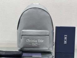 DIOR RIDER BACKPACK GRAY GRAINED CALFSKIN WTIH "CHRISTIAN DIOR 1947" SIGNATURE - DIO23