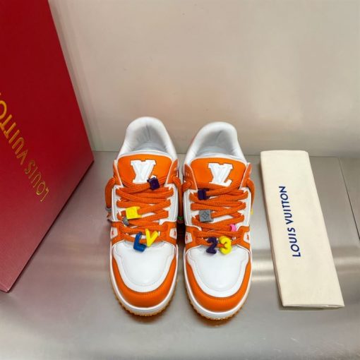 LOUIS VUITTON TRAINER MAXI LOW-TOP SNEAKERS IN WHITE AND ORANGE - LVS115